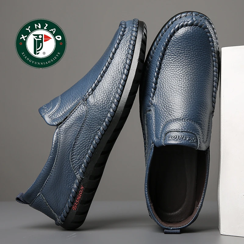 啄木鸟男鞋春秋新款透气镂空洞洞中年爸爸鞋一脚蹬皮凉鞋子软底