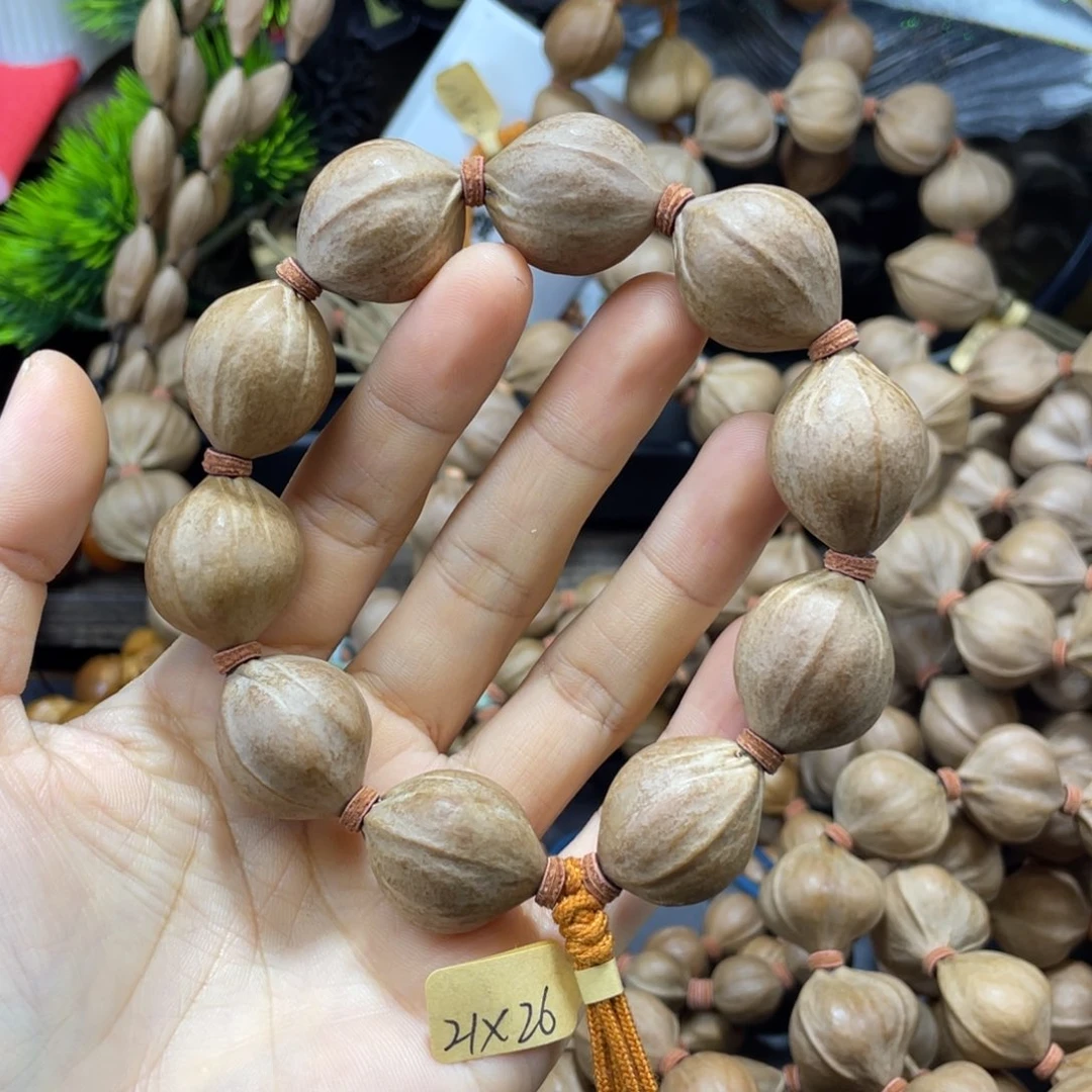 济***生橄榄核吊坠2126老料