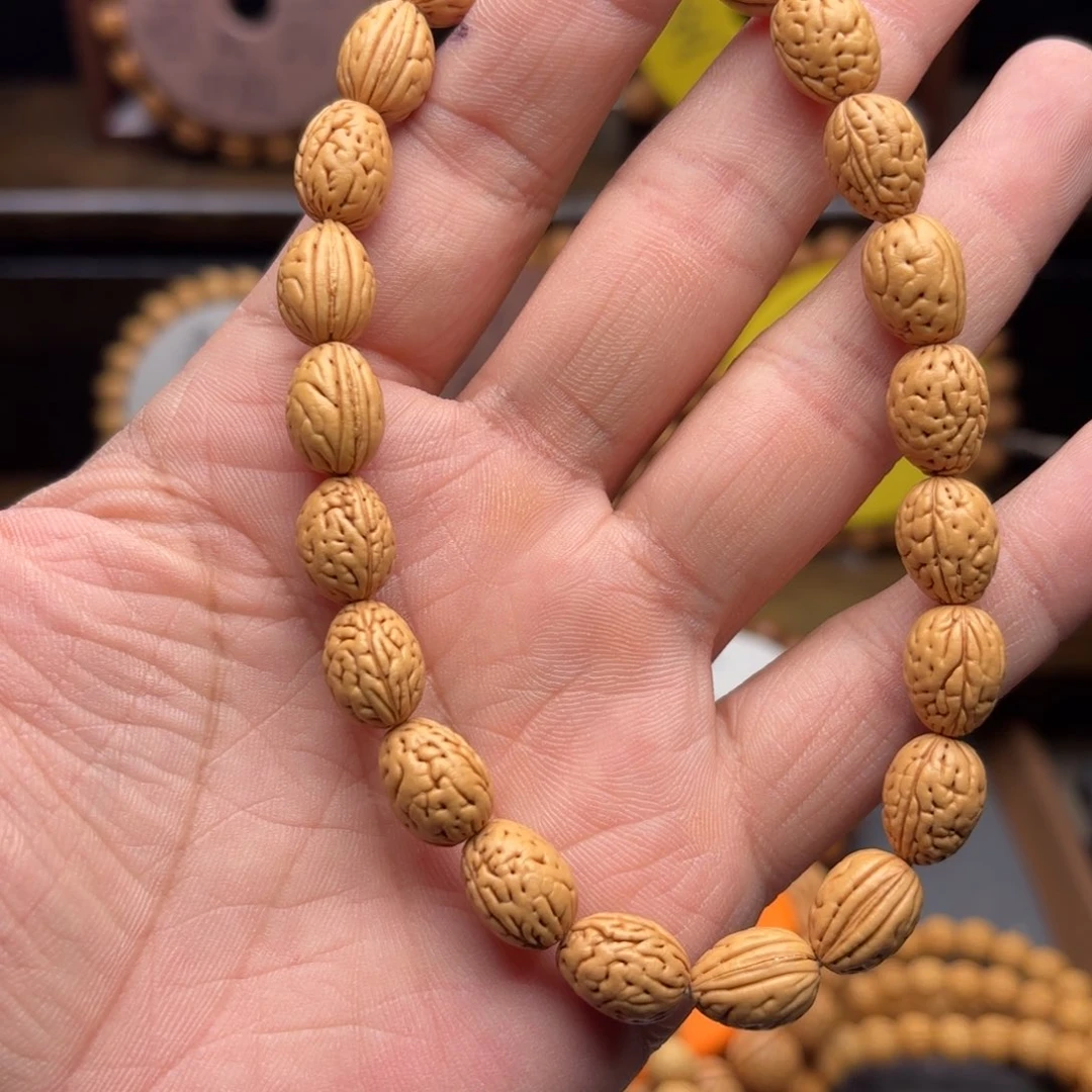 泛***、手串桃核钱袋子桃核