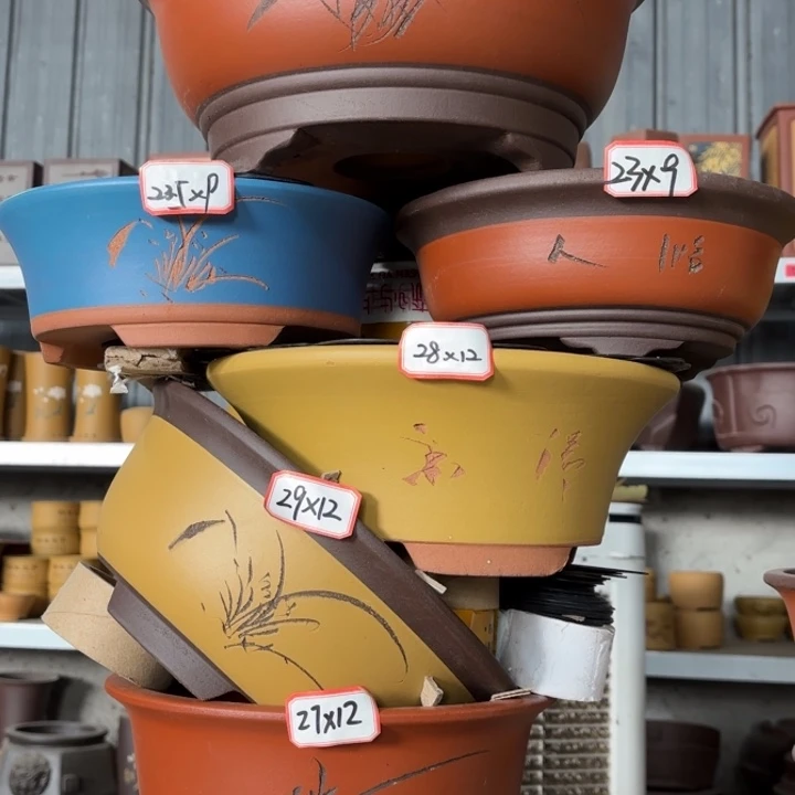 紫砂花盆100-6。