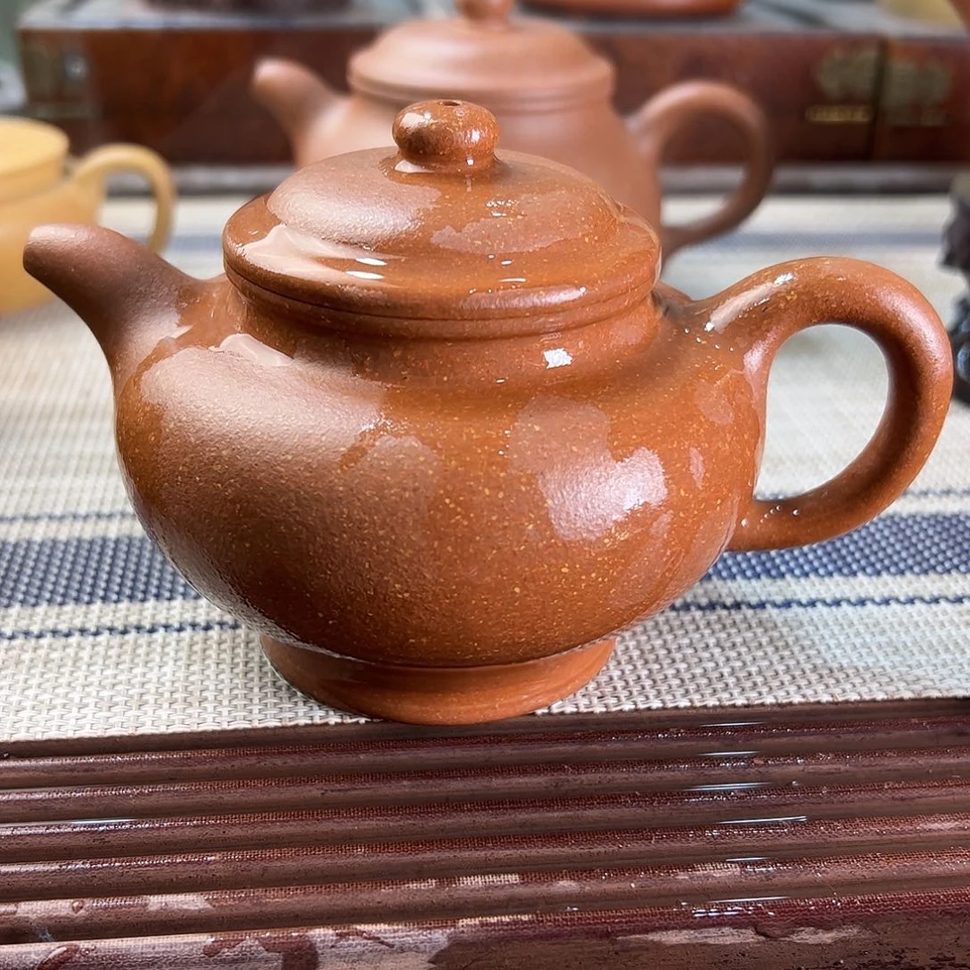 紫砂茶壶红降坡掇只