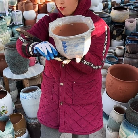 口21高15瑕疵盆子。