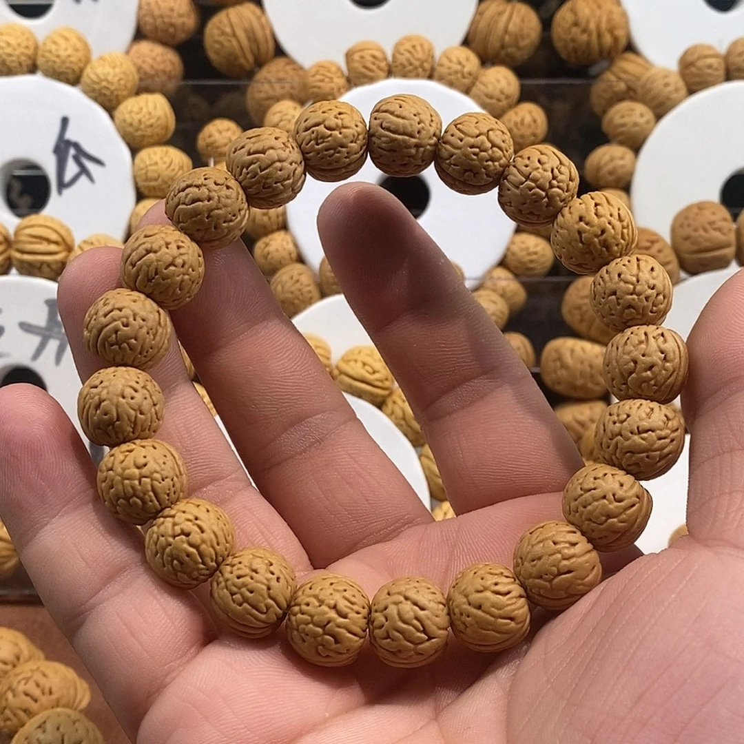 菩***束桃核吊坠金丹13.5…..