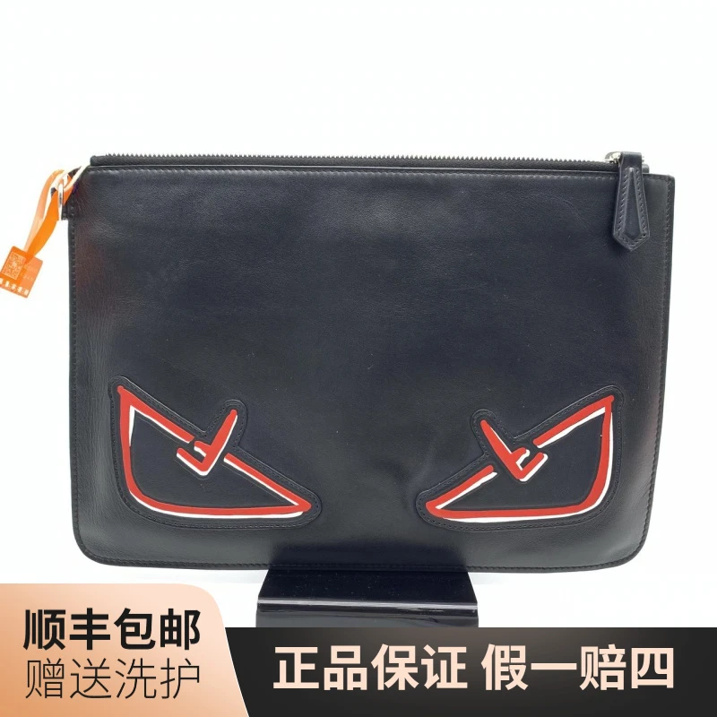 95新 FENDI/芬迪  芬迪黑色红眼睛手拿包/10006458时尚休闲经典