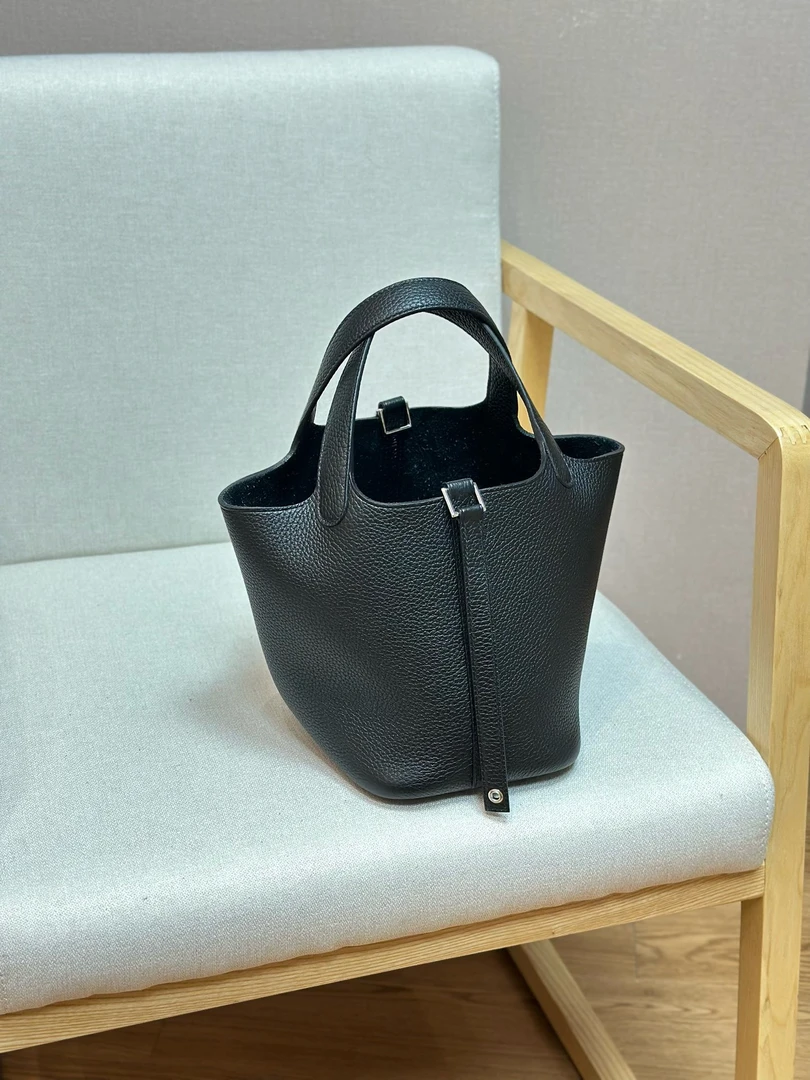 牛皮小号经典菜篮子女包包.欣
