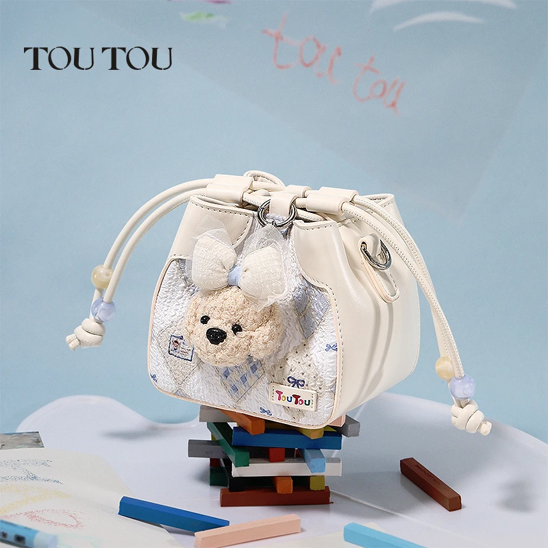 蜡笔小狗烧麦包2025新款抽绳水桶包小众设计可爱单肩斜挎包