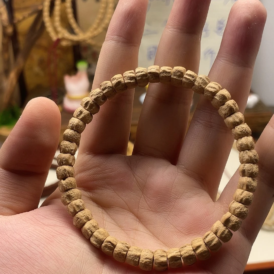 胡***娱柏香籽/百香籽手串1002