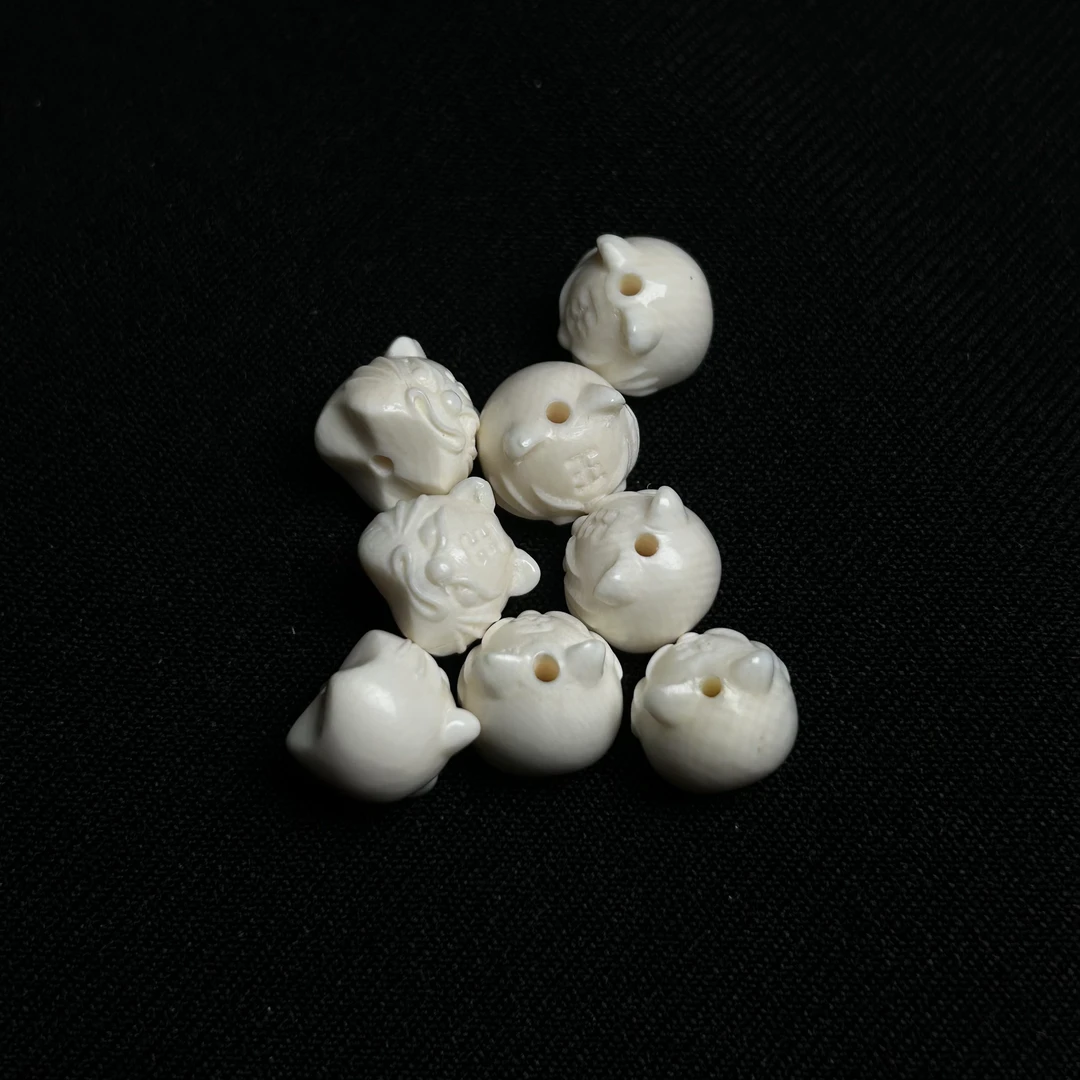 P263 只做天然猛犸象牙 虎头珠 约10mm