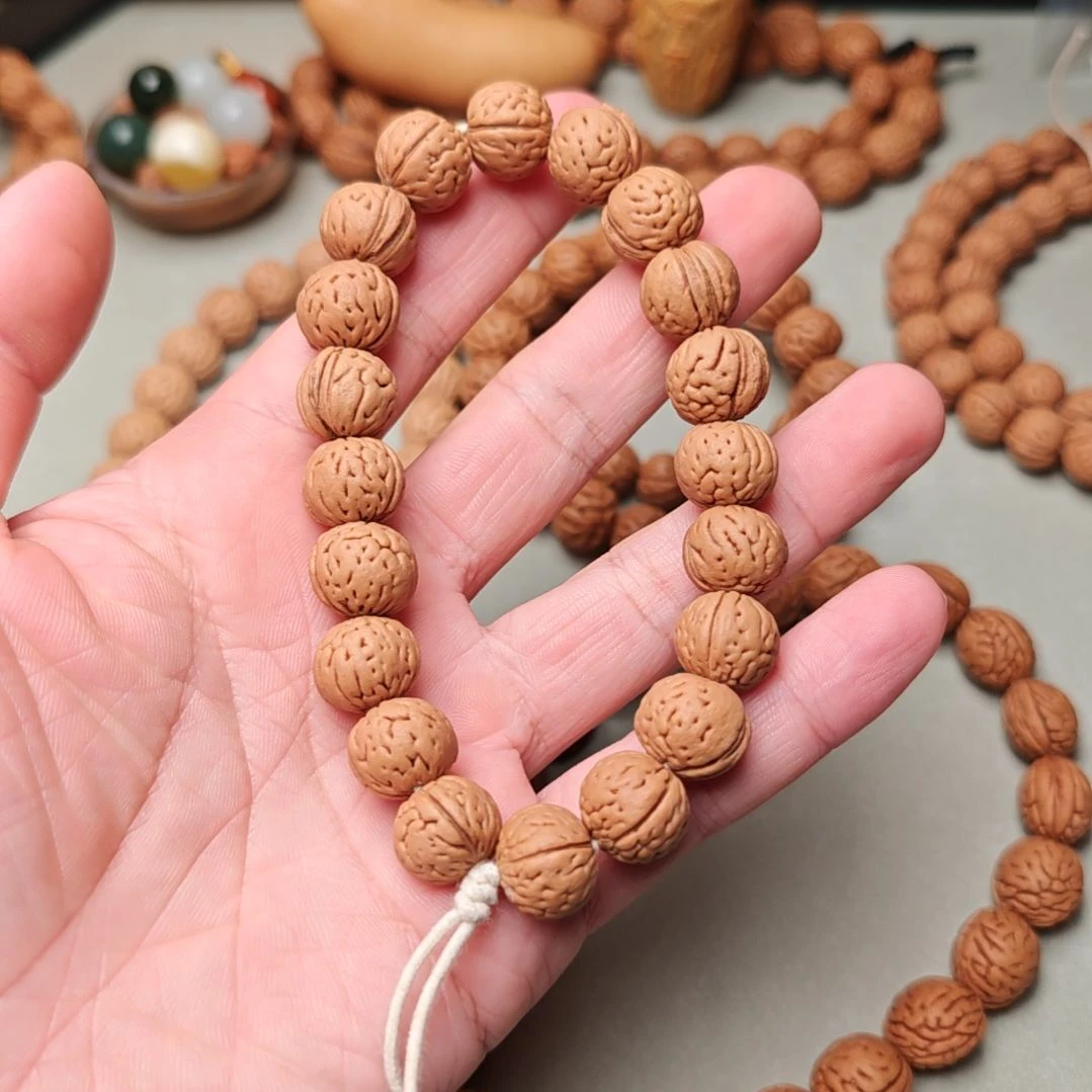 桃核吊坠秦岭野生肌肉纹桃核手串