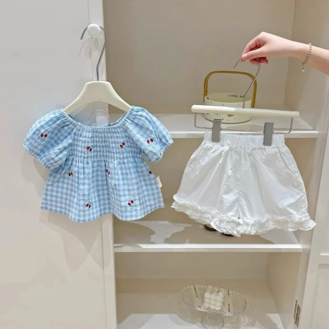 韩版女宝宝2025夏季新款甜美俏皮格纹泡泡袖上衣花边短裤两件套潮