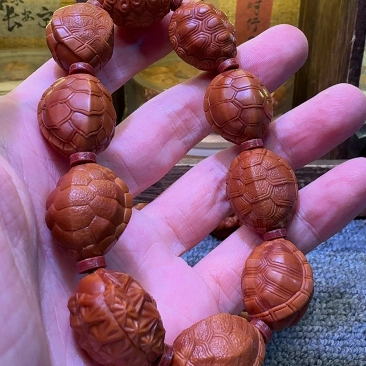 橄榄核吊坠怕啦啦啦