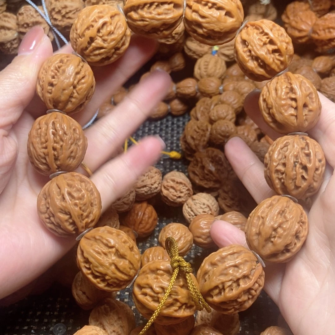 桃核吊坠粗筋麻花手串