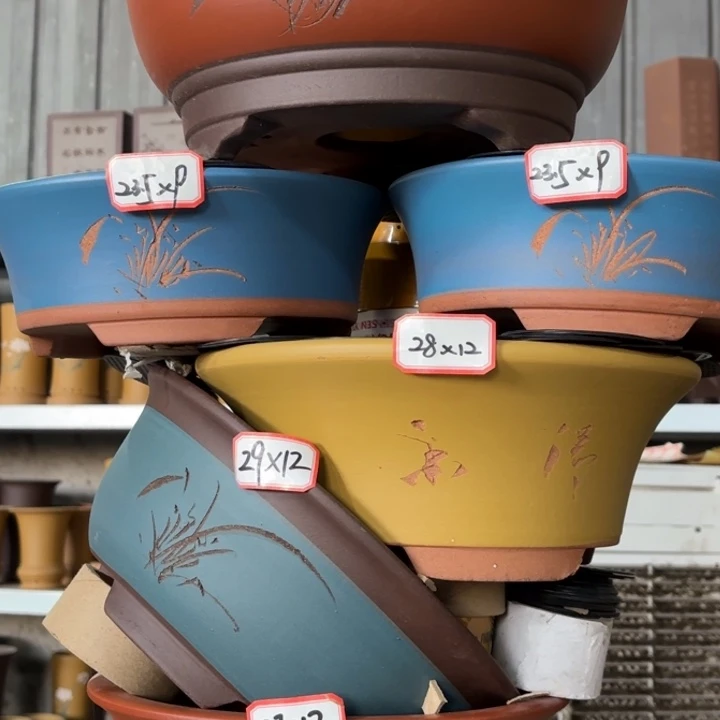 紫砂花盆100-6。