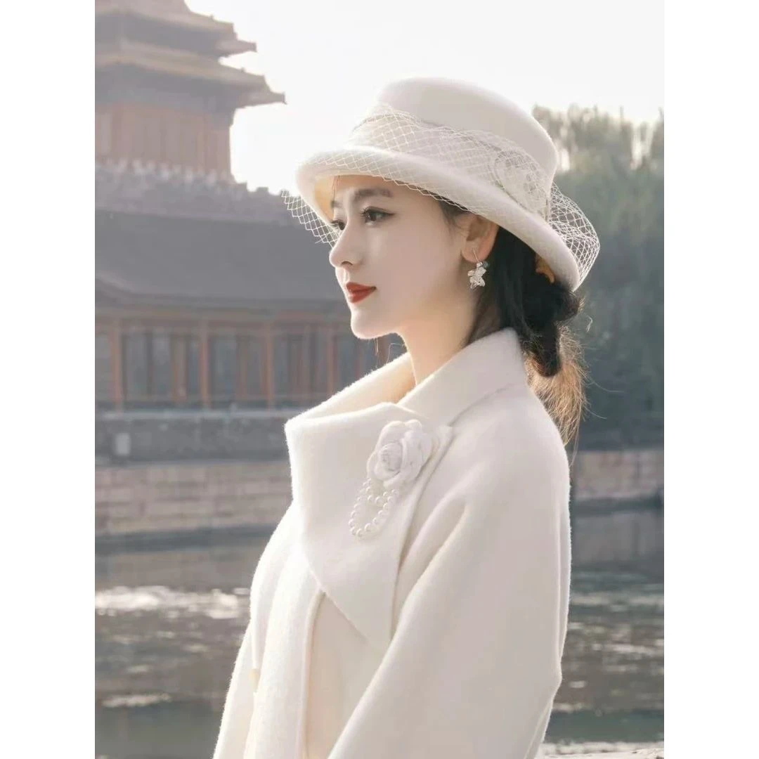 法式复古白色羊毛盆帽女秋冬高级感气质网纱蝴蝶结礼帽渔夫帽子