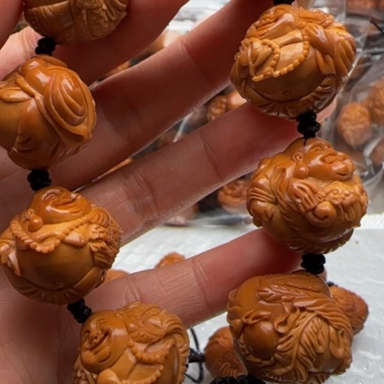 浮***萍橄榄核手串橄榄雕工艺的