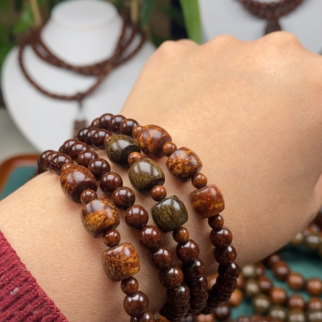 贡木手串/手链贡木0.6红冰爆星配龙鳞多宝