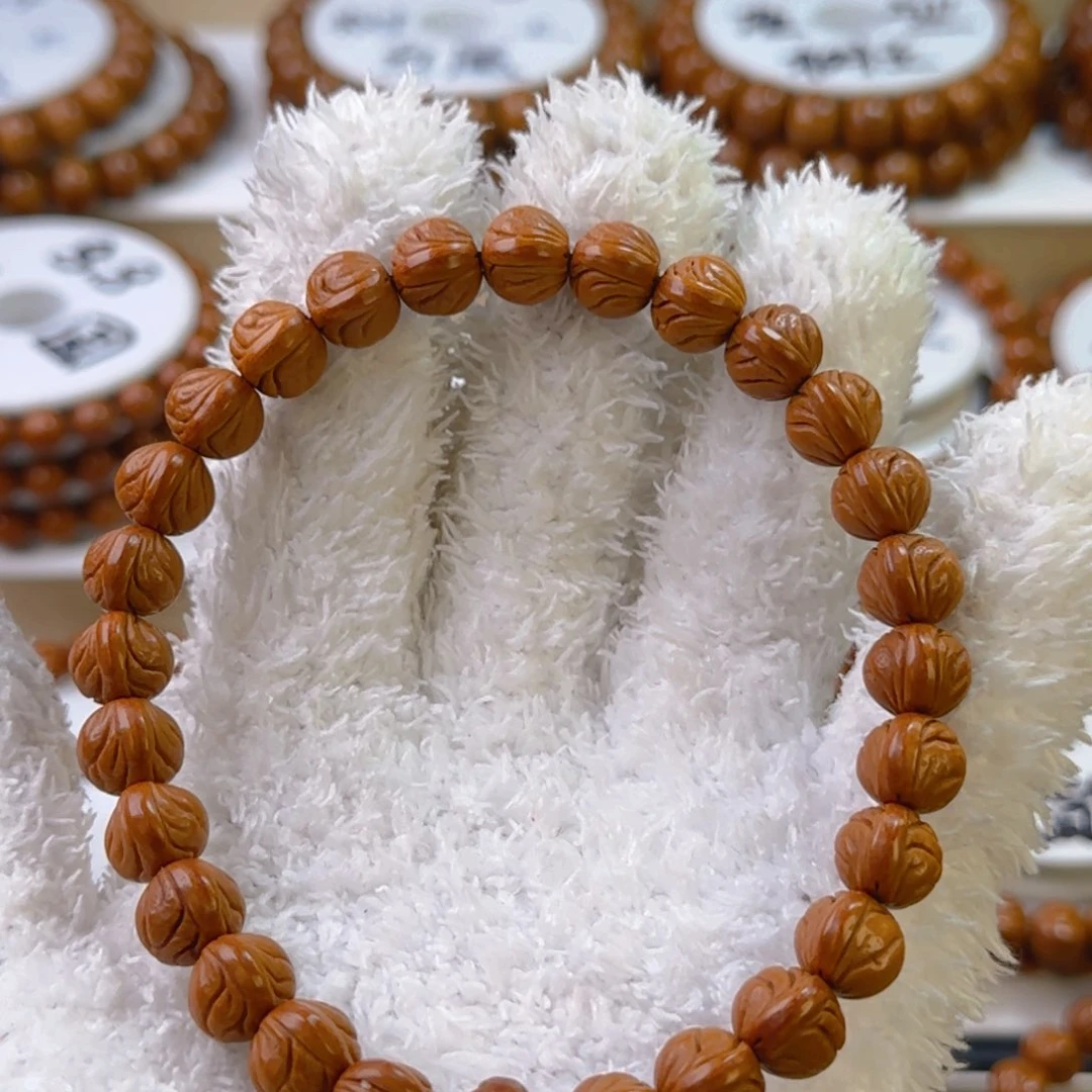 桃核手串平*果龙纹桃核元宝手持