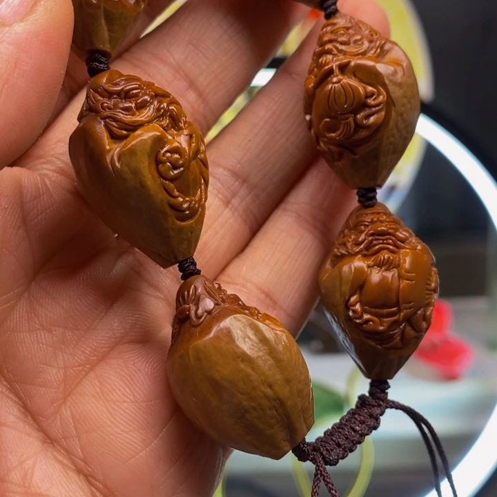 橄榄核吊坠欢欢回家后斤斤计较斤斤计较