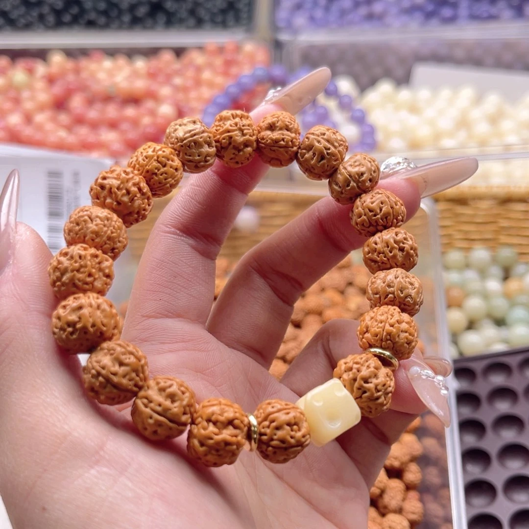 白玉菩提吊坠z9mm150颗。金刚 有大小