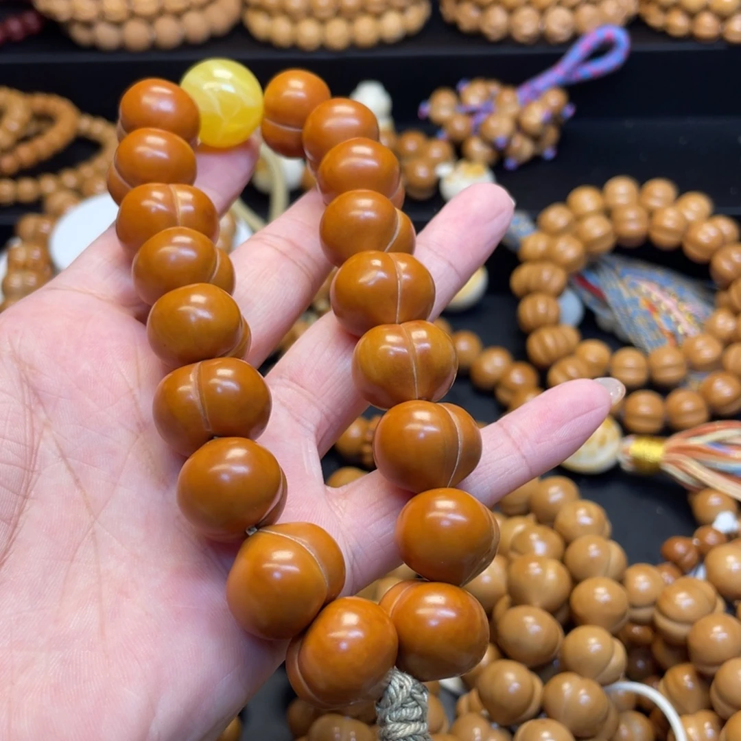 琪***子吊坠猴头核桃全品屁桃手持