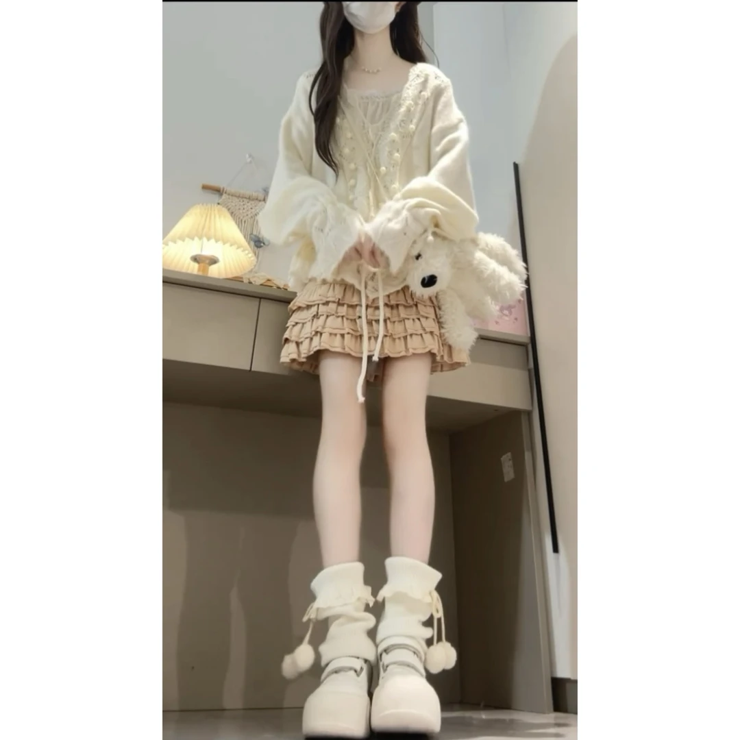 秋冬穿搭一整套韩系慵懒镂空钩花v领长袖针织毛衣女蛋糕短裙套装