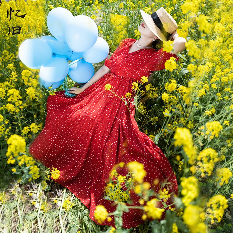 【莺啭花间】文艺V领红波点连衣裙收腰A字裙女2025年春雪纺印花裙