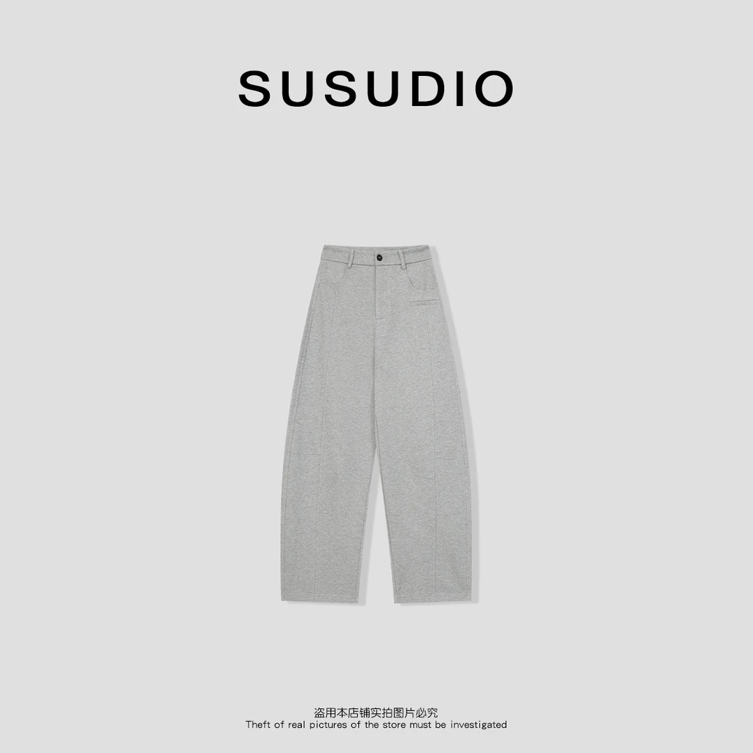 SUSUDIO 设计感舒适亲肤质感修饰腿型弯刀休闲裤250059