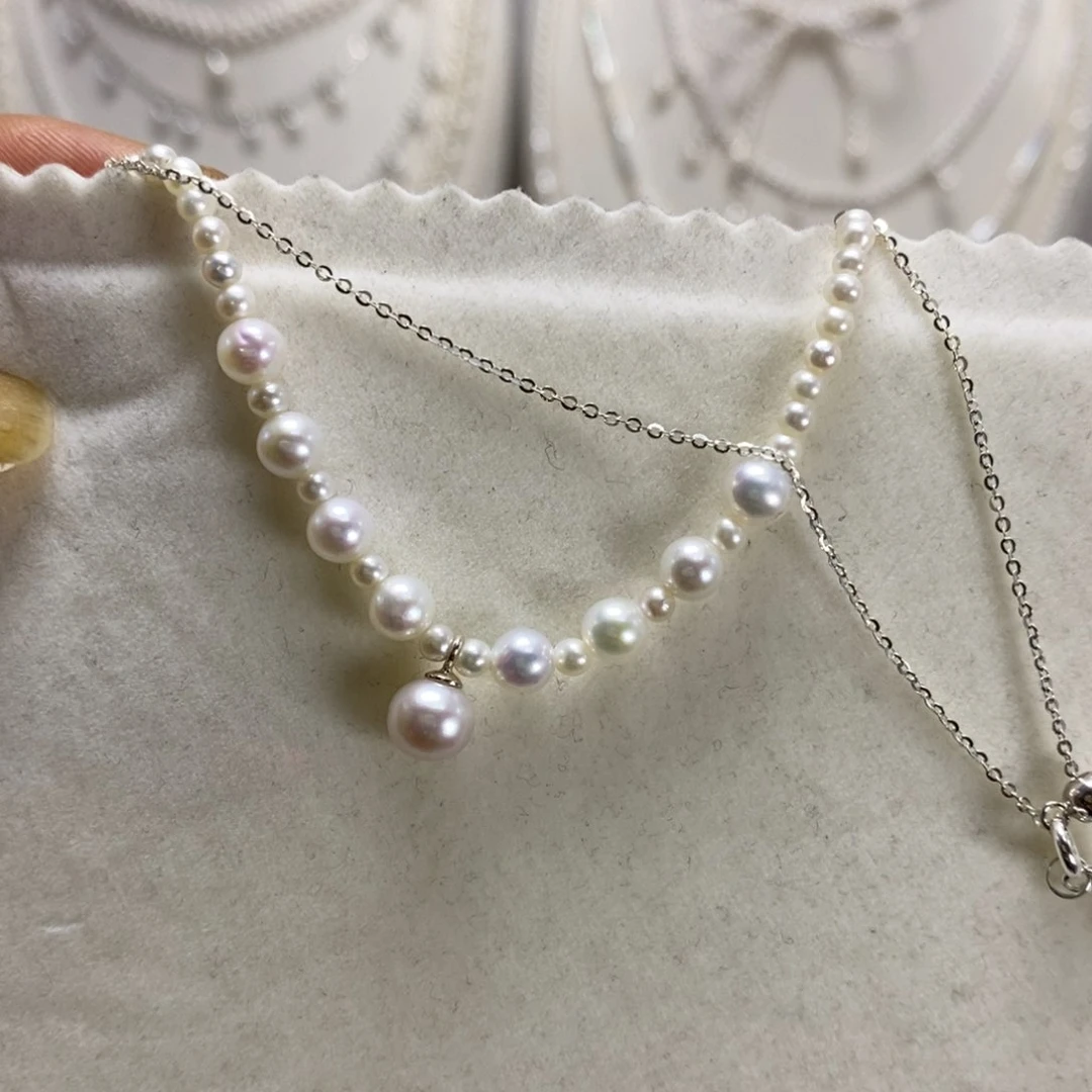 星***婷淡水珍珠银S925镶嵌颈饰