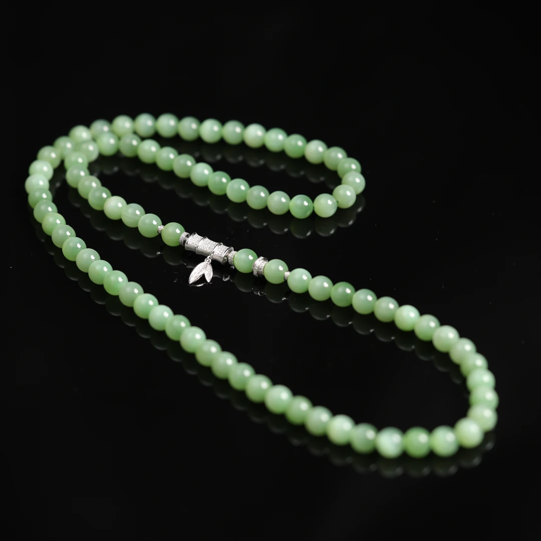 薄荷精灵 | 传承臻品和田玉黑羊洞起荧光猫眼7mm+项链