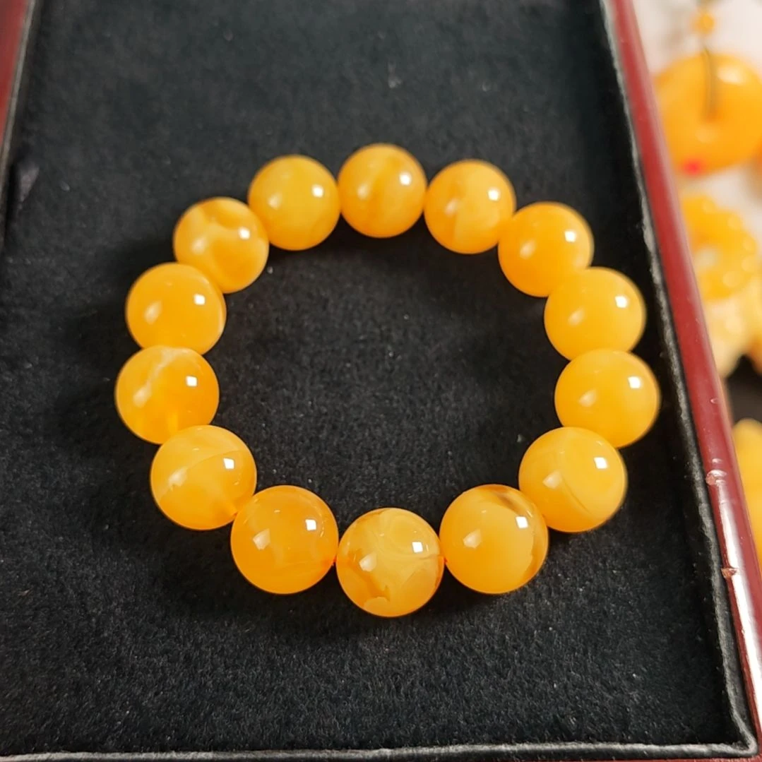 手串蜜蜡未镶嵌同料手串16的。