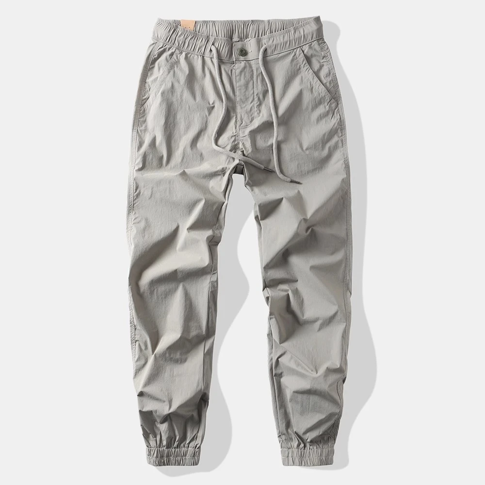 夏季薄款休闲长裤宽松运动弹力束脚裤男士黑色工装裤速干透气小脚