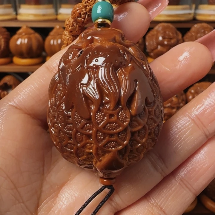 橄榄核把件梅*龙龟手把件40