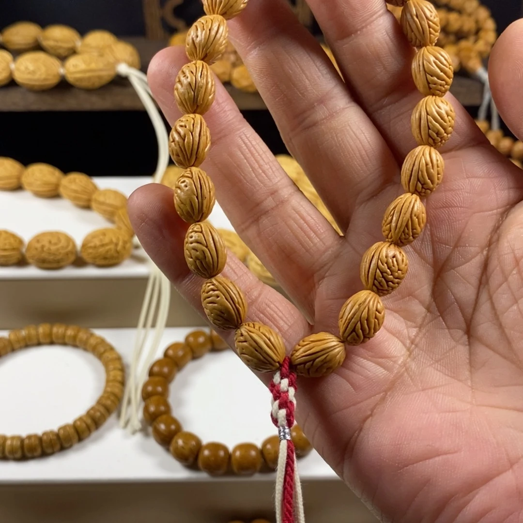 一***风吊坠桃核桃核钱袋子麦穗纹肌肉