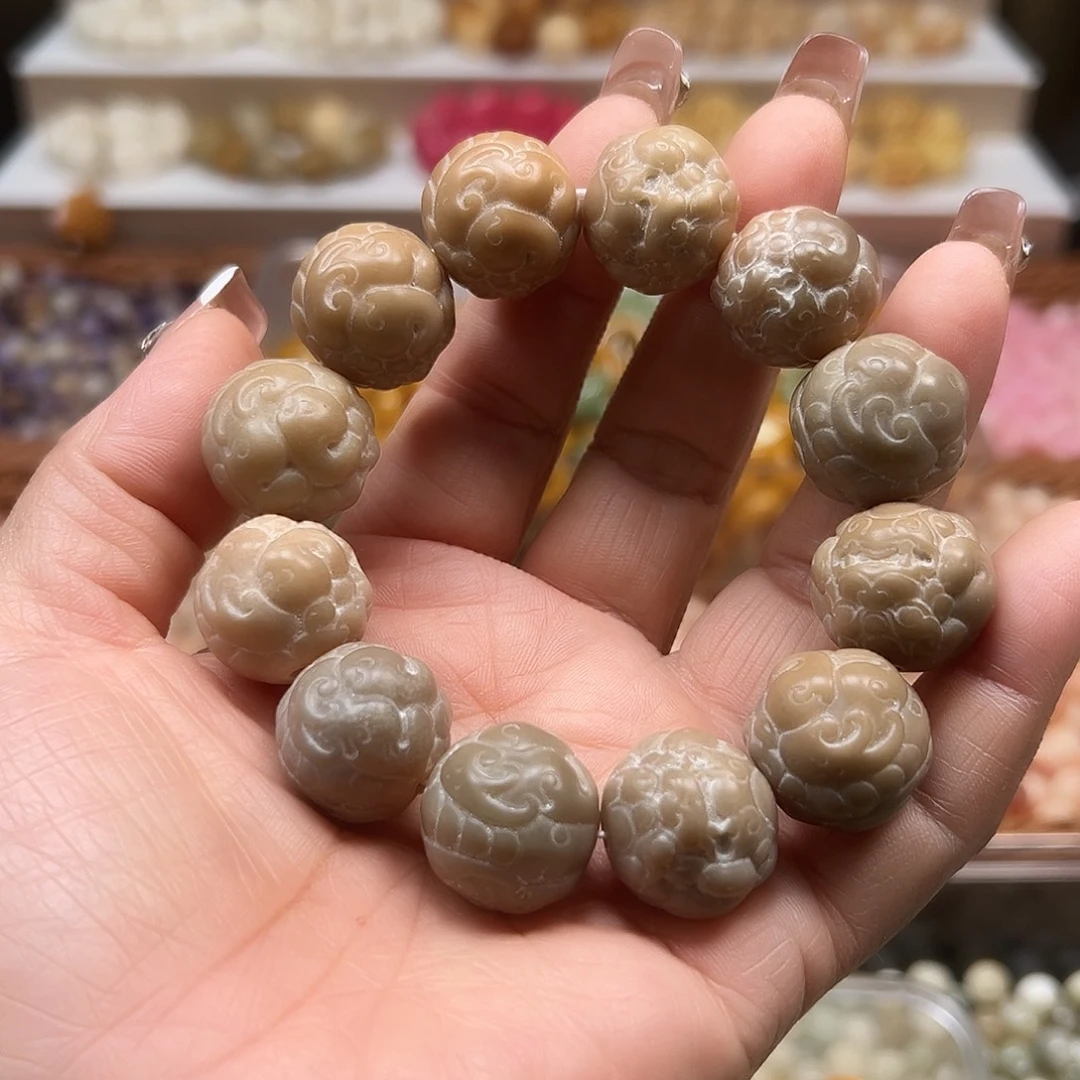 手串菩提根/象牙果瑕疵貔貅1条