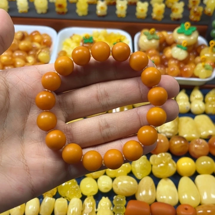 琥珀未镶嵌裸石卡11大加老蜡橘皮圆珠手串