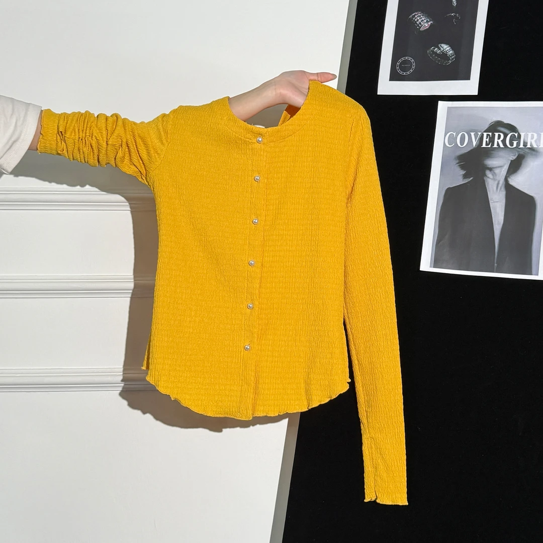 黄色显白肌理感珍珠纽扣长袖针织开衫女2025秋季木耳边设计感上衣