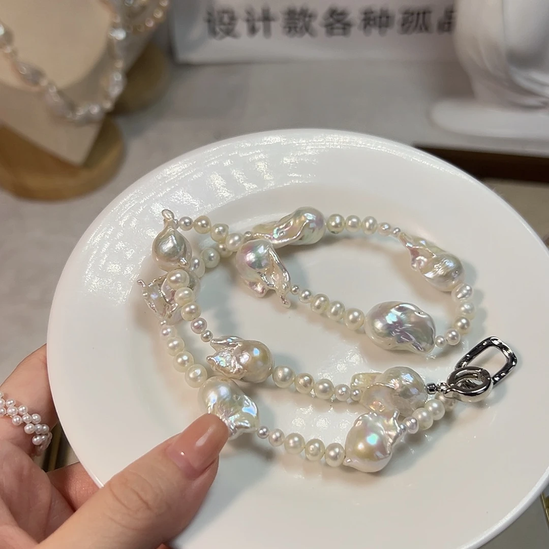 Z***n银S925镶嵌天然淡水珍珠设计款淡水珍珠