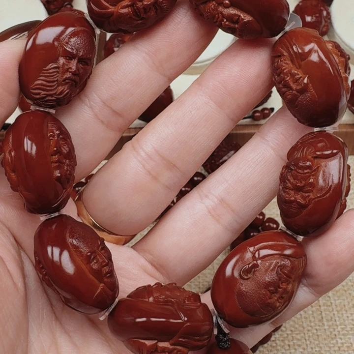 兖****业橄榄核精品十八罗汉