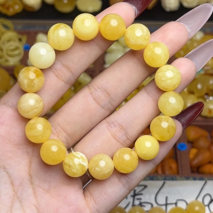 蜜蜡未镶嵌珠宝奇石微瑕放漏 鸡油黄满蜡妖花手串卡13