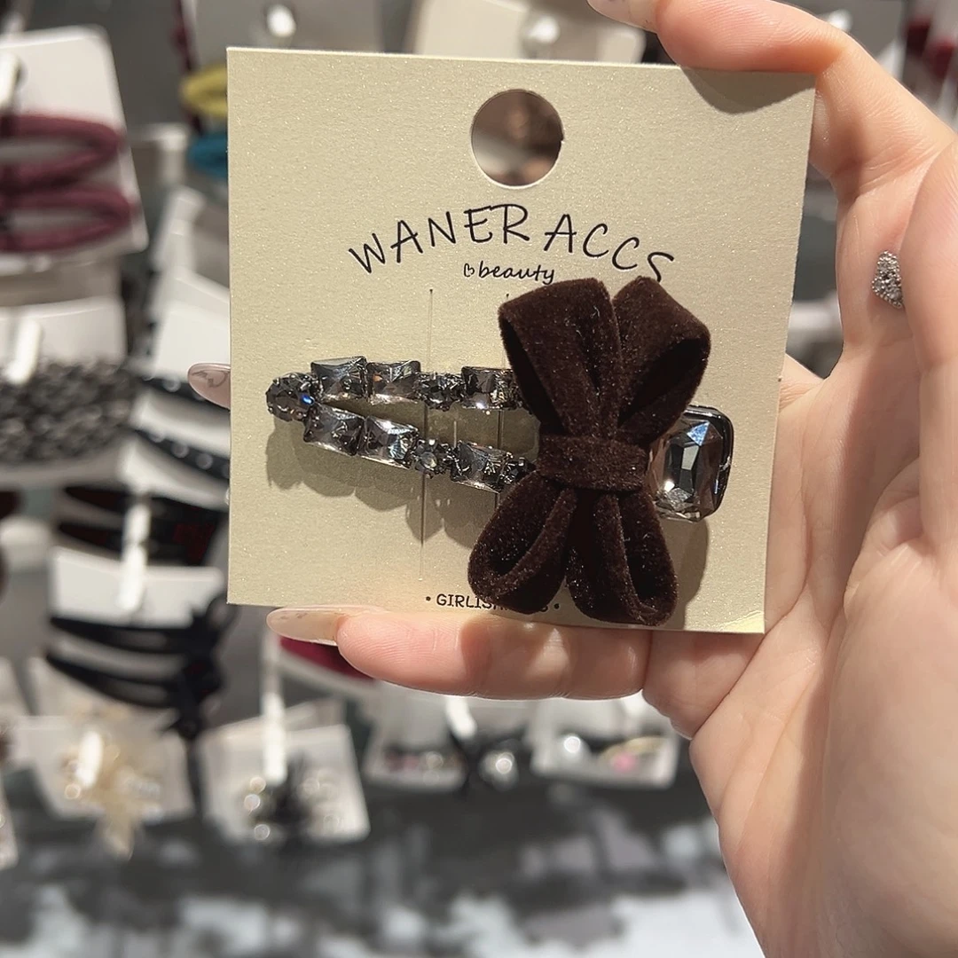 皮质铁合金咖色蝴蝶结鸭夹