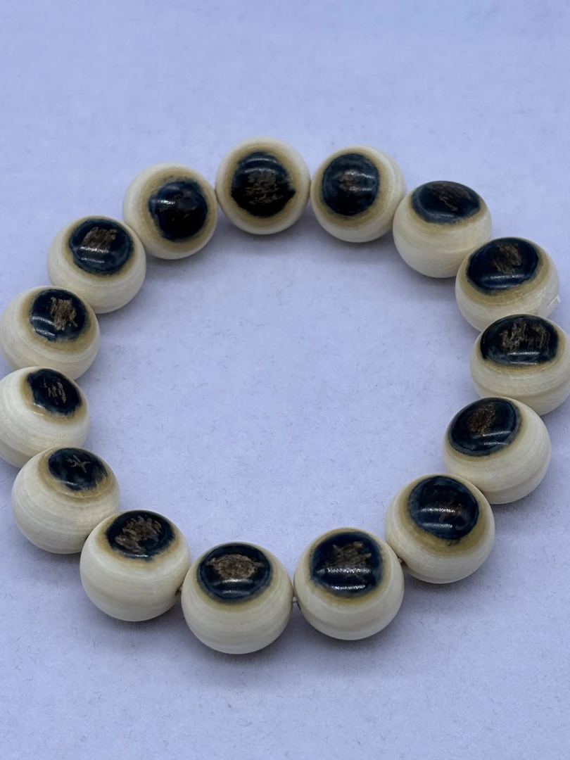 A072 猛犸牙蓝眼圆珠手串约15mm 金亮老师