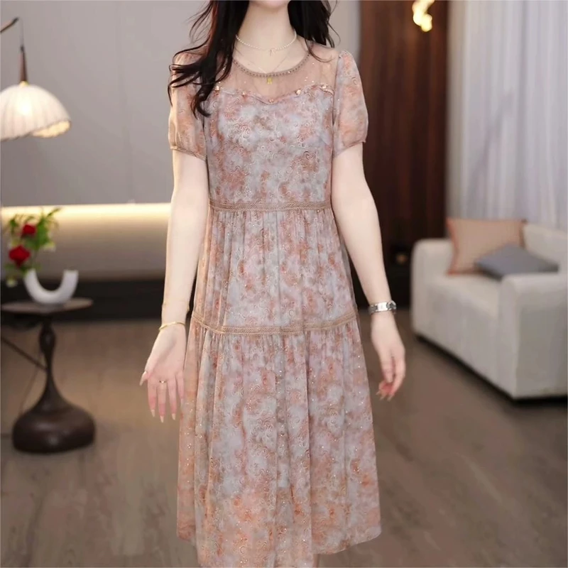 2025夏季新款高级感短袖连衣裙显瘦减龄花纹蛋糕裙子
