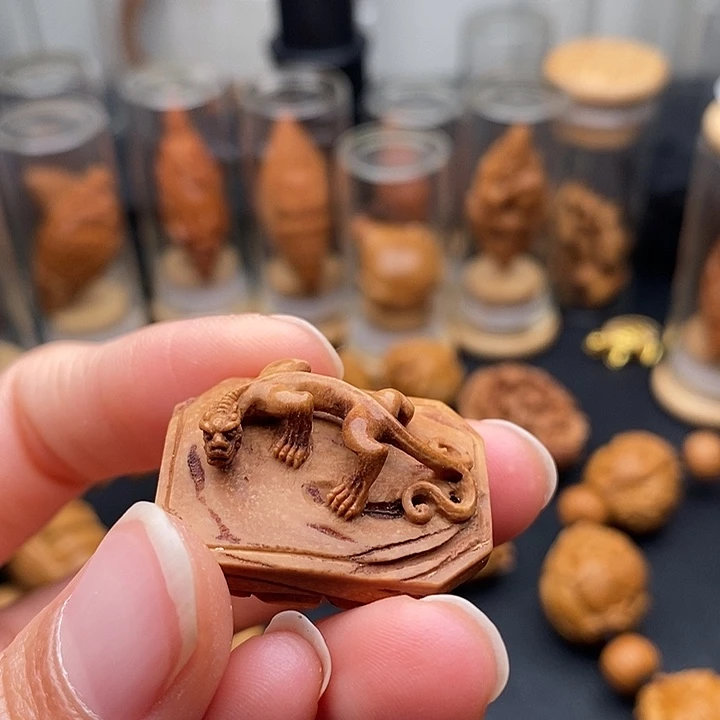 橄榄核吊坠雷****媒螭龙单子