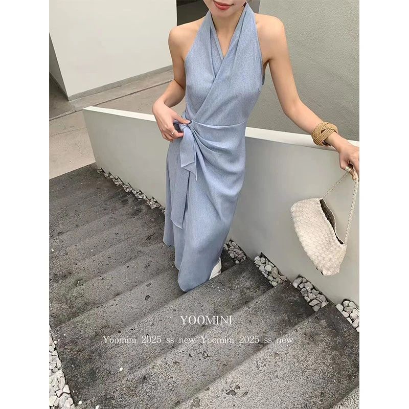 法式度假风V领挂脖交叉打结连衣裙女2025新款收腰显瘦气质长裙子