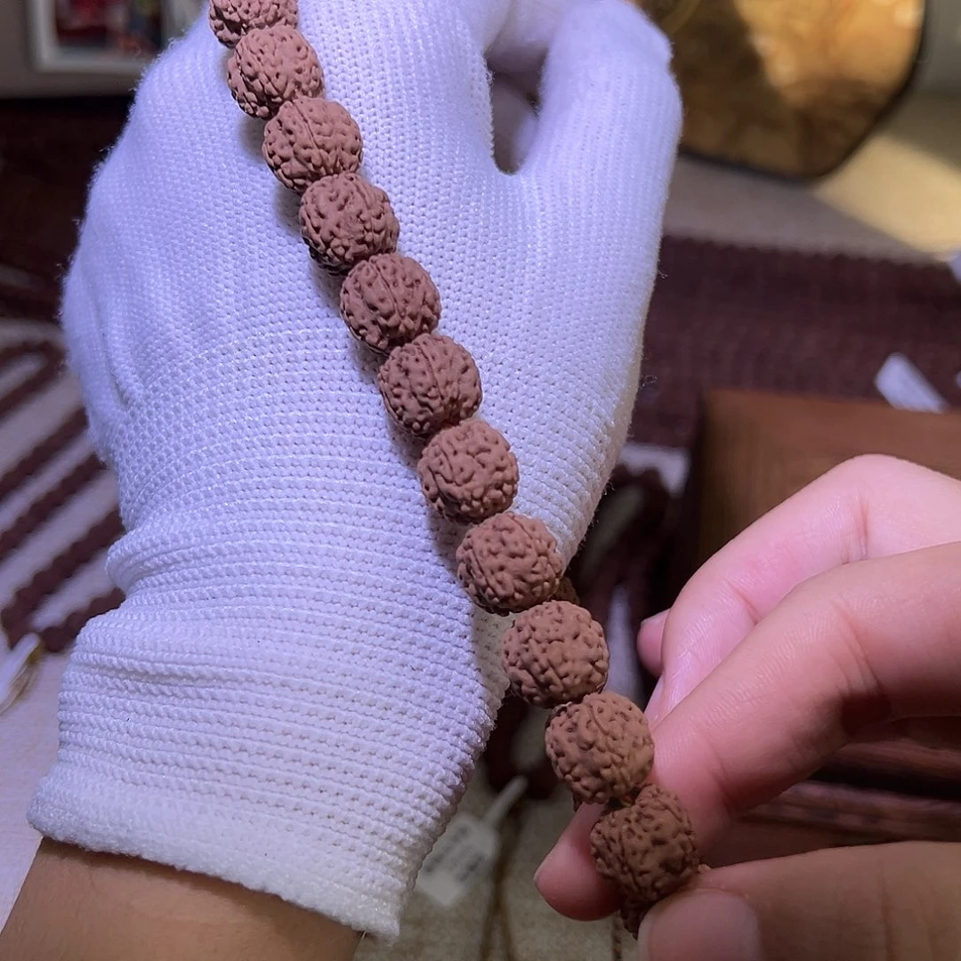 请***8金刚菩提吊坠老树梅花12mm手持