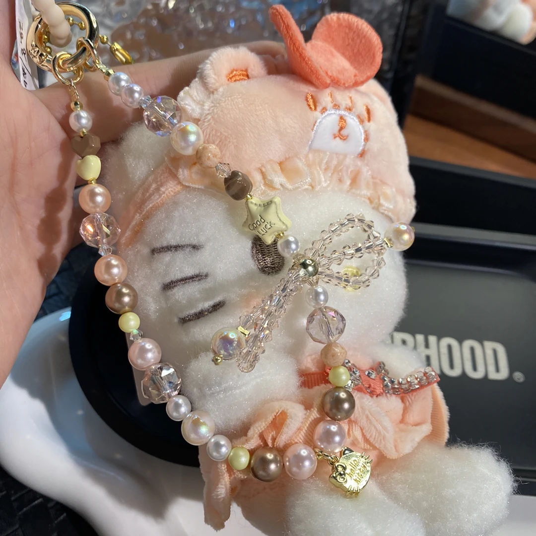 5239橘色娃娃挂件原创手机链