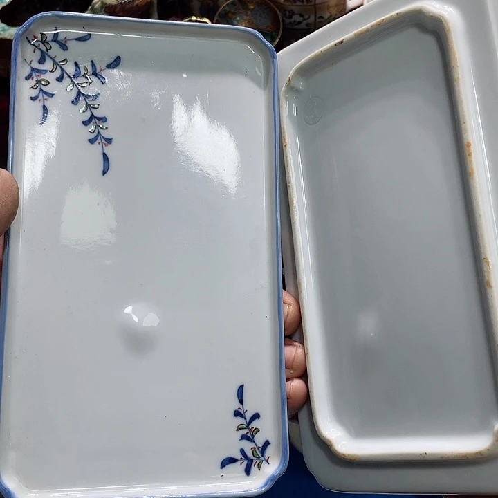 瓷片让给别人看了一下就