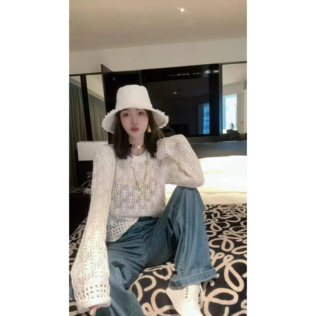 KIKI严选：011-欧洲站南油春季新款时尚镂空圆领长袖针织衫