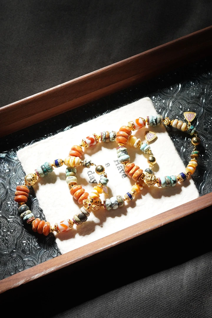 小豹子 天然猛犸牙随形药片多宝单圈手串 多样性发其一