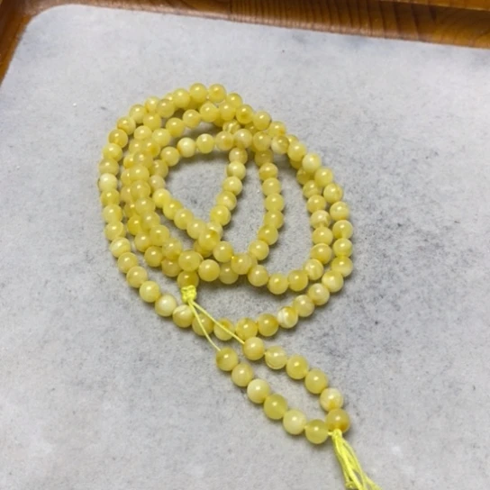 蜜蜡裸石未镶嵌串